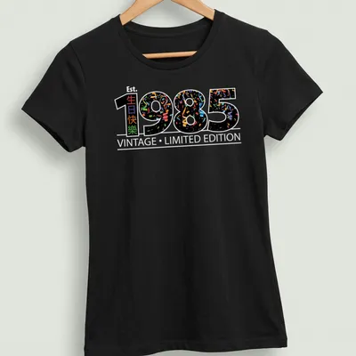 Vintage T-shirt with colorful confetti design celebrating 1985 and birthday wishes in Chinese. — printed on a women's shirt