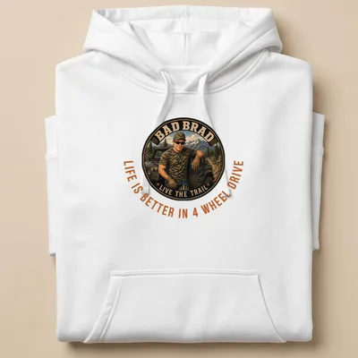Off-roading man in vintage style with text about 4 wheel drive life — printed on a unisex hoodie