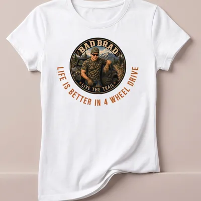 Off-roading man in vintage style with text about 4 wheel drive life — printed on a women's shirt