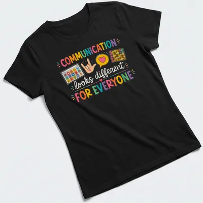 Colorful design with AAC speech therapy symbols and gestures, featuring vibrant text. — printed on a women's shirt