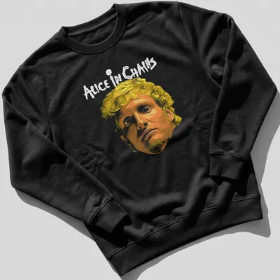 Artistic portrait featuring the iconic face and text 'ALICE IN CHAINS' in yellow and orange — printed on a unisex sweatshirt