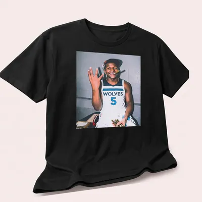 Photographic print of Anthony Edwards celebrating with a cigar in hand. — printed on a unisex t-shirt (angled view)