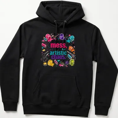 Colorful watercolor print featuring crafting supplies and the phrase 'It's not a mess, it's artistic chaos.' — printed on a unisex hoodie