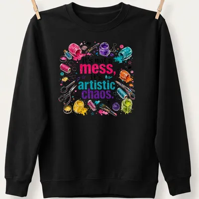 Colorful watercolor print featuring crafting supplies and the phrase 'It's not a mess, it's artistic chaos.' — printed on a unisex sweatshirt