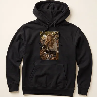 Realistic illustration of a woman eating bratwurst in festival colors — printed on a unisex hoodie