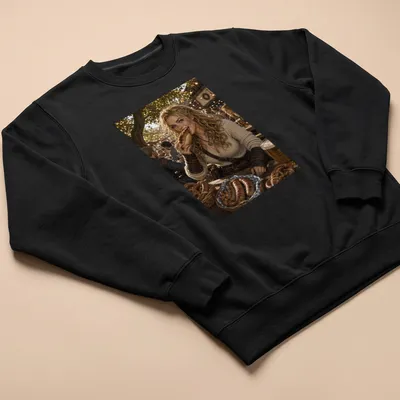 Realistic illustration of a woman eating bratwurst in festival colors — printed on a unisex sweatshirt