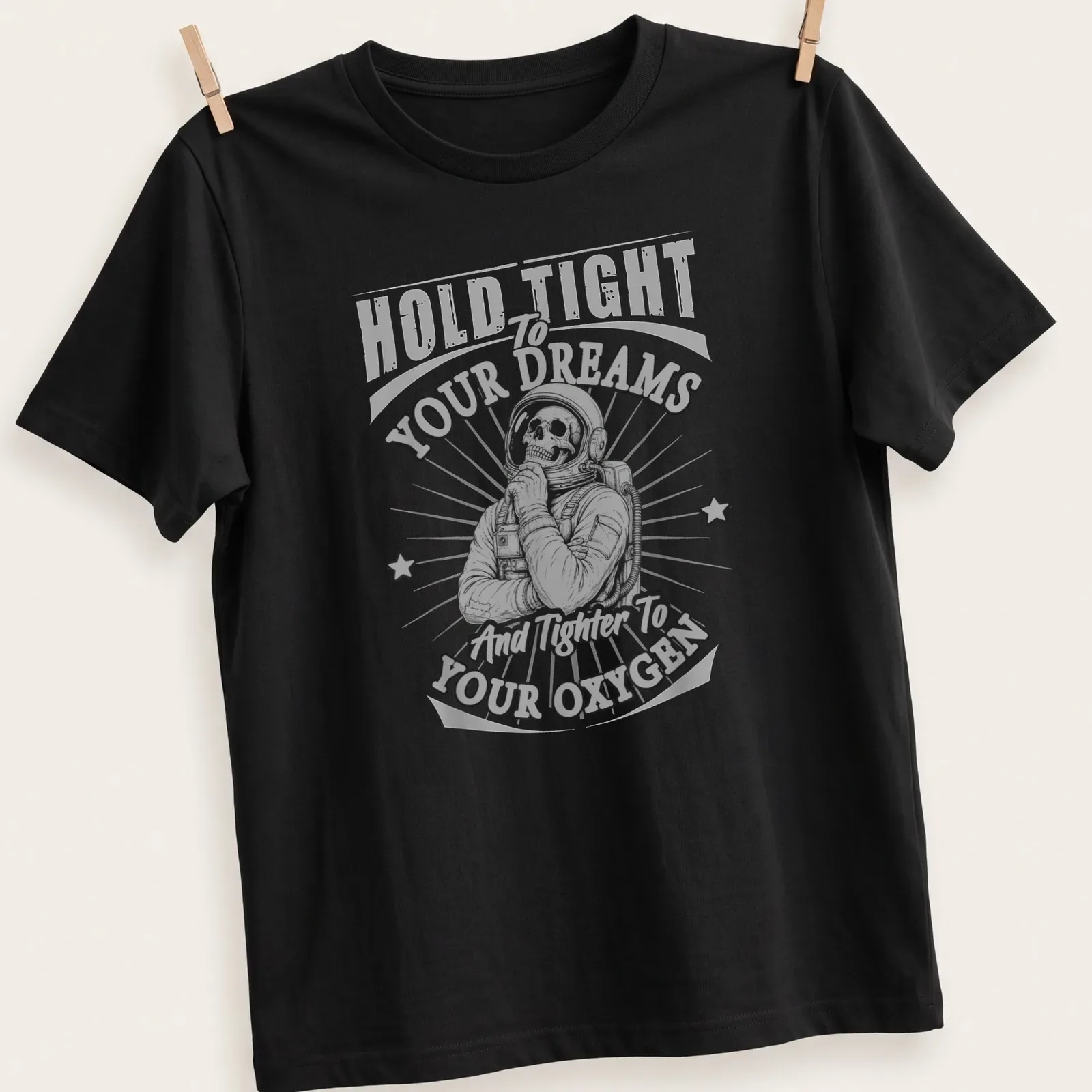 Skeleton astronaut graphic with text about dreams and oxygen in vintage style — printed on a unisex t-shirt