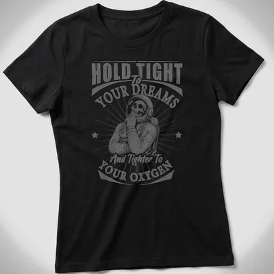 Skeleton astronaut graphic with text about dreams and oxygen in vintage style — printed on a women's shirt