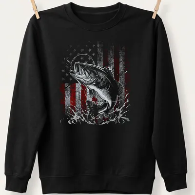 Bass fish jumping with an American flag background in vintage distressed style — printed on a unisex sweatshirt