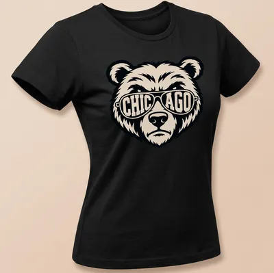Graphic tee featuring a bear wearing sunglasses with bold text above — printed on a women's shirt