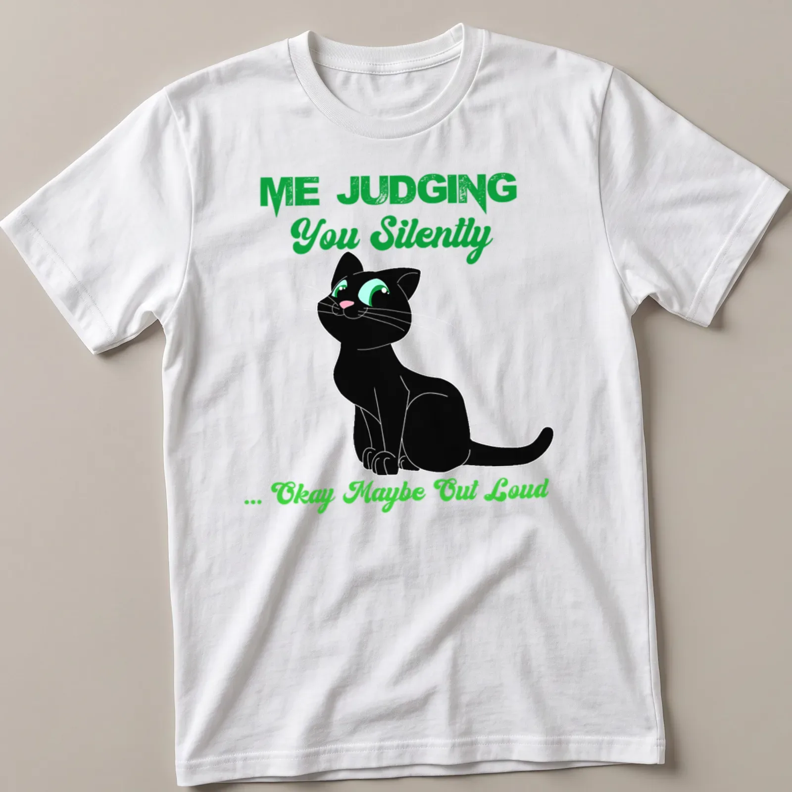 Cartoon black cat with text about judging, in black, green, and white colors — printed on a unisex t-shirt