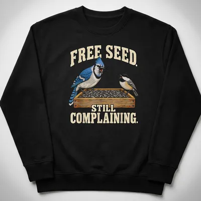Illustration of a Blue Jay with humorous text about free seeds — printed on a unisex sweatshirt