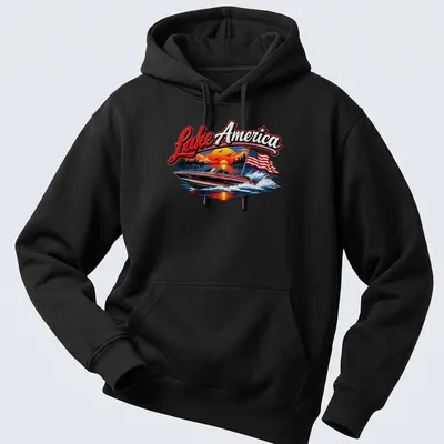 Vibrant t-shirt featuring a boat on Lake America with a sunset and American flag — printed on a unisex hoodie