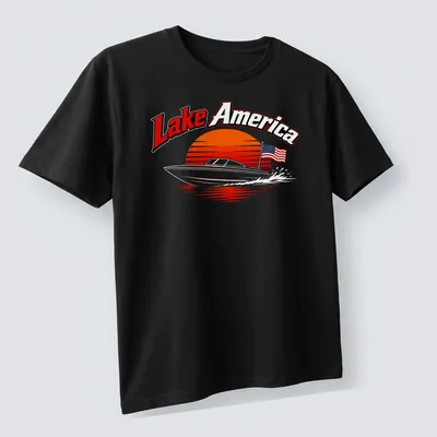 Retro print featuring a boat on a lake with sunset colors and Lake America text — printed on a unisex t-shirt (angled view)