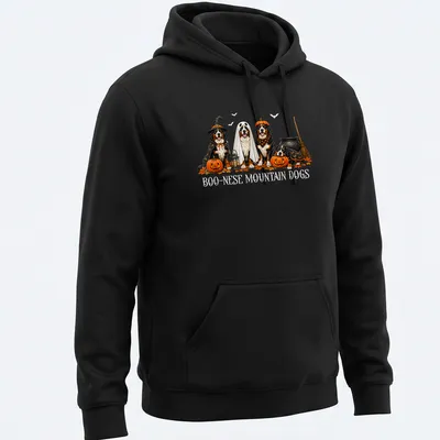 Illustrative Halloween scene featuring Boo Nese Mountain Dogs in witch costumes with pumpkins — printed on a unisex hoodie