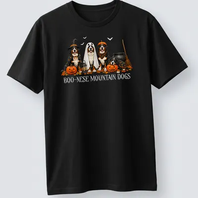 Illustrative Halloween scene featuring Boo Nese Mountain Dogs in witch costumes with pumpkins