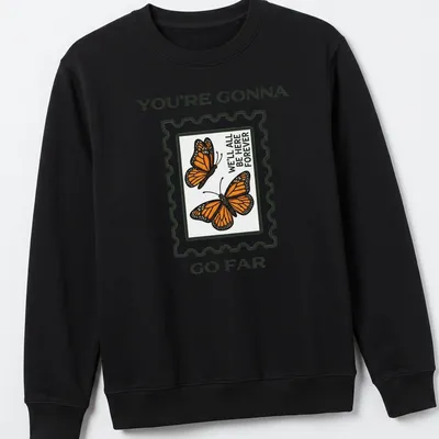 Illustrative t-shirt featuring colorful butterflies and an inspirational message — printed on a unisex sweatshirt