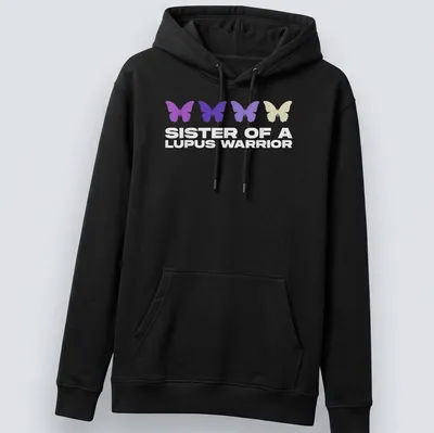 Stylish T-shirt featuring butterflies and the phrase 'Sister of a Lupus Warrior' in modern typography. — printed on a unisex hoodie