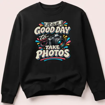 Colorful retro design with printed text: It is a GOOD DAY to TAKE PHOTOS, featuring a camera. — printed on a unisex sweatshirt