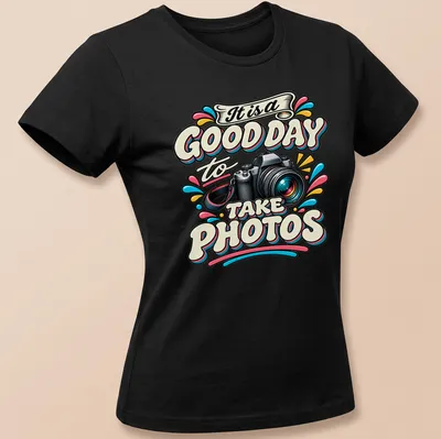 Colorful retro design with printed text: It is a GOOD DAY to TAKE PHOTOS, featuring a camera. — printed on a women's shirt