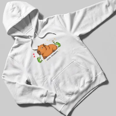 Kawaii style capybara surrounded by frog fans with text 'LOCAL CELEBRITY.' — printed on a unisex hoodie