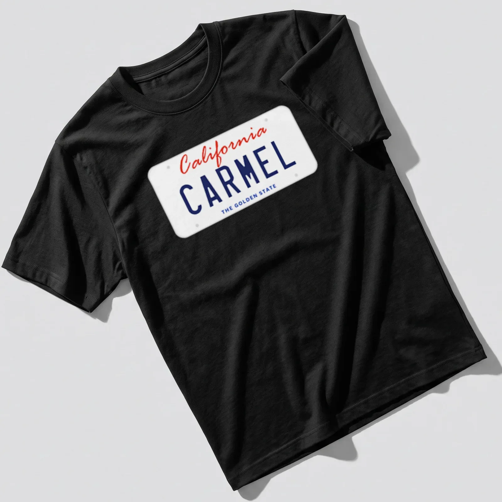 California Carmel license plate design in red and blue on a white — printed on a unisex t-shirt