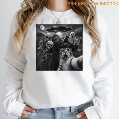 Humorous cat selfie with Bigfoot, skeleton, alien, and ghost graphic. — printed on a sweatshirt