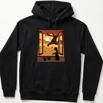 Black cat watching an autumn sunset through a window beside coffee — printed on a unisex hoodie