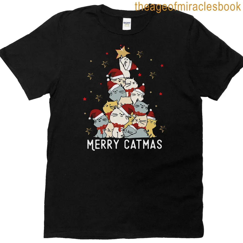 Cartoon cats in Santa hats with Merry Catmas text on a festive shirt.