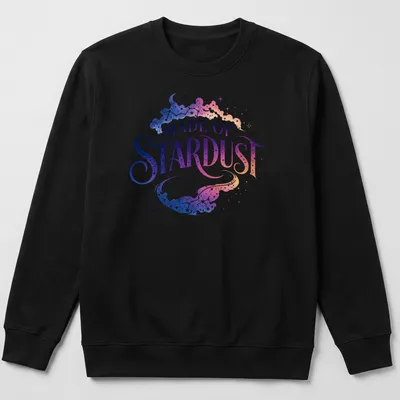 Celestial galaxy design with text 'MADE OF STARDUST' in purple, blue, pink, and white — printed on a unisex sweatshirt