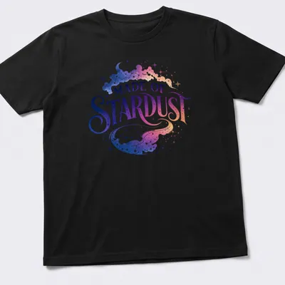 Celestial galaxy design with text 'MADE OF STARDUST' in purple, blue, pink, and white
