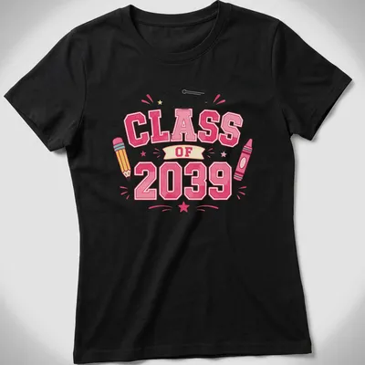 Colorful cartoon graduation design featuring crayon, pencil, and cap for Class of 2039 — printed on a women's shirt