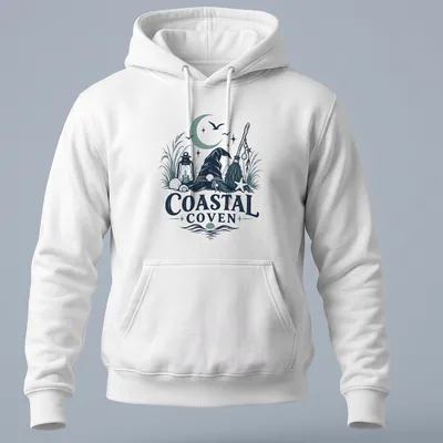 Vintage illustrated Coastal Coven t-shirt with witch hat and coastal motifs — printed on a unisex hoodie