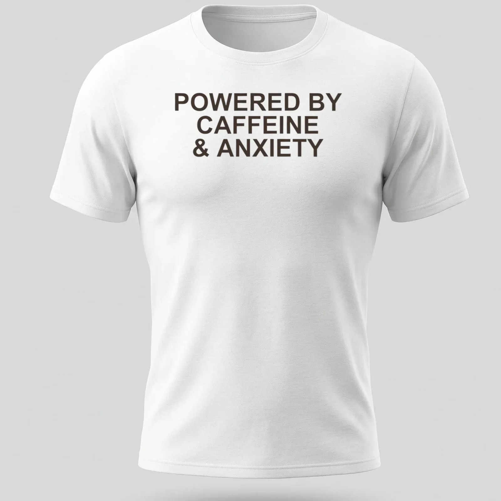 Bold typography t-shirt with the phrase 'Powered By Caffeine & Anxiety' in brown — printed on a unisex t-shirt
