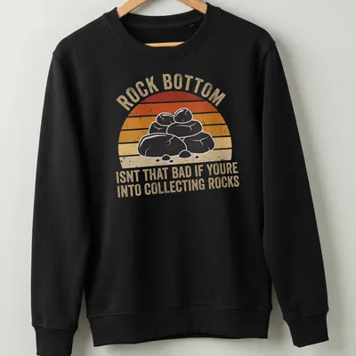 Retro distressed shirt with the phrase about rock collecting and illustrated rocks — printed on a unisex sweatshirt