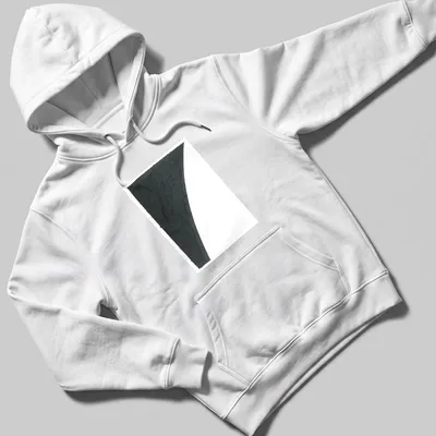 Abstract design with colored paper fragments and printed text in black and white. — printed on a unisex hoodie