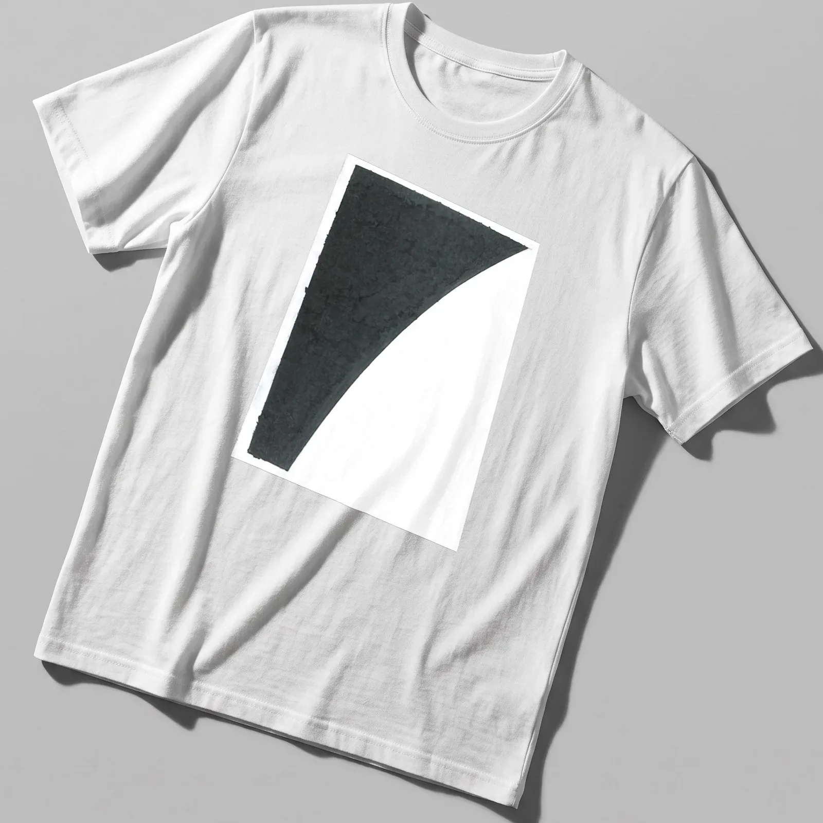 Abstract design with colored paper fragments and printed text in black and white. — printed on a unisex t-shirt