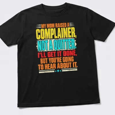 Bold typography shirt with colorful text about complaining and determination