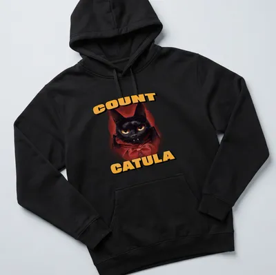Vintage cartoon Count Catula design featuring a black cat for Halloween. — printed on a unisex hoodie