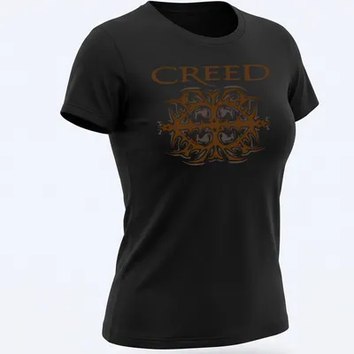 Ornate printed design of the Creed band logo in brown and white — printed on a women's shirt