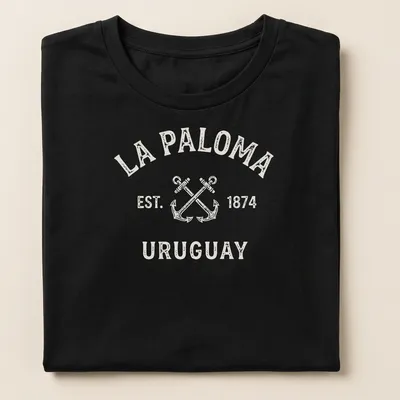 Vintage design with crossed boat anchors and La Paloma text in cream and light beige. — printed on a women's shirt