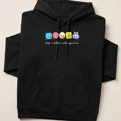 Kawaii cartoon print of cute food squishies with the text 'Life is better with squishies' — printed on a unisex hoodie