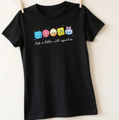 Kawaii cartoon print of cute food squishies with the text 'Life is better with squishies' — printed on a women's shirt