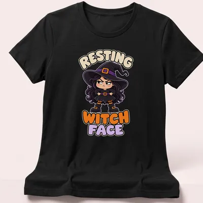 Kawaii grumpy witch illustration with Resting Witch Face text in purple, black, orange, and beige — printed on a women's shirt
