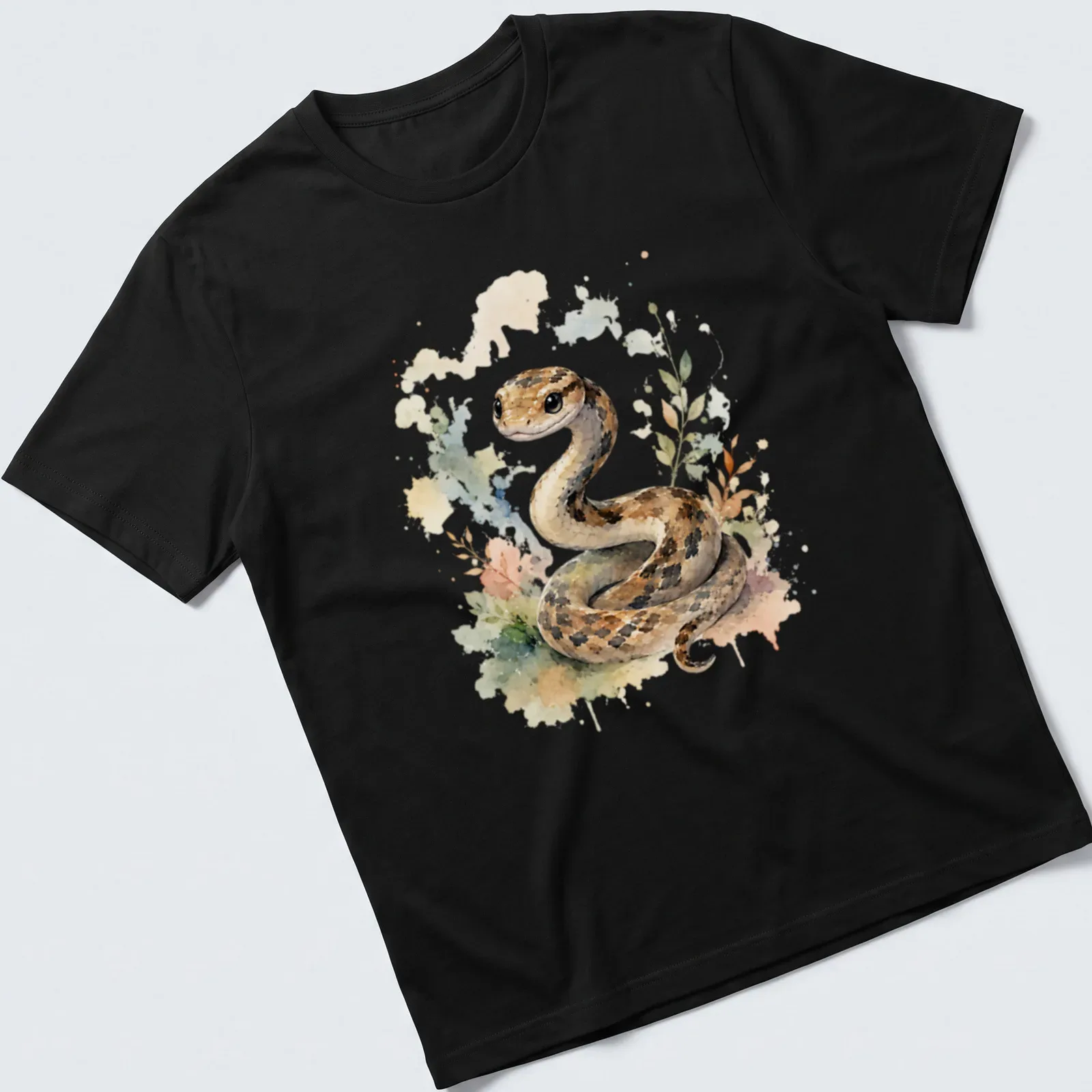 Watercolor illustration of a cute snake in brown, cream, green, pink, and blue. — printed on a unisex t-shirt
