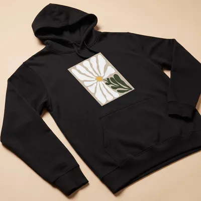 Minimalist illustration of a daisy flower in soft colors — printed on a unisex hoodie