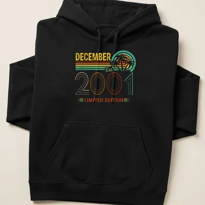 Vintage retro December birthday t-shirt with colorful text and fun design — printed on a unisex hoodie