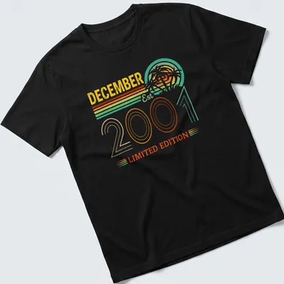 Vintage retro December birthday t-shirt with colorful text and fun design — printed on a unisex t-shirt