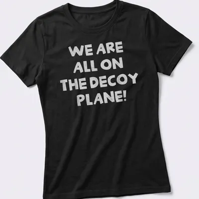 Bold typography t-shirt with the phrase 'We Are All On The Decoy Plane!' and a decoy plane graphic. — printed on a women's shirt