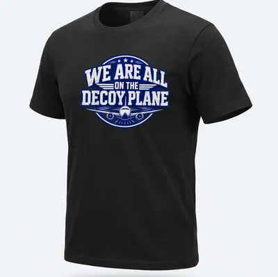 Bold vintage print of a decoy plane with text reading 'We Are All On The Decoy Plane'